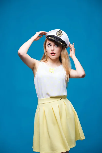 Beautiful girl in style of pin-up, Dresses captain cap — Stok fotoğraf