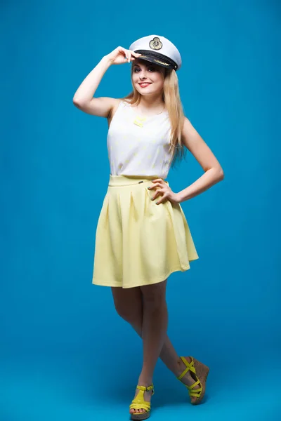 Beautiful girl in style of pin-up, Dresses captain cap — Stockfoto