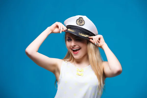 Beautiful girl in style of pin-up, Dresses captain cap — Stockfoto