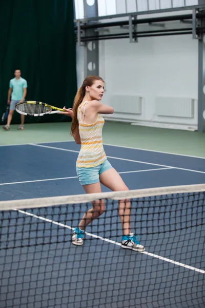 Young sporty girl playing tennis — Stock Photo, Image