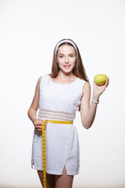 kadın tutun ölçekler, elma