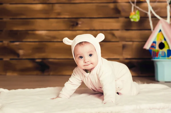 Little girl. child in pink overalls with ears. — Stock Photo, Image