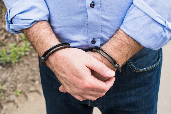 Bussinessman in handcuffs — Stock Photo, Image