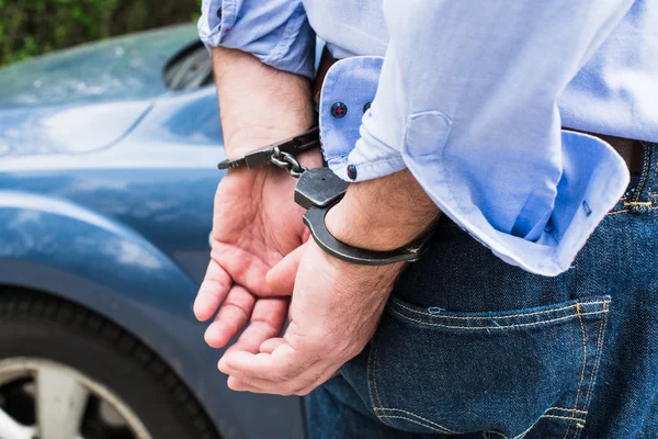 Bussinessman in handcuffs — Stock Photo, Image