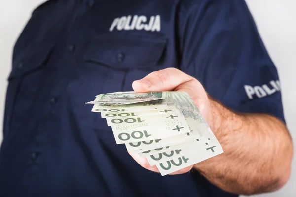 The policeman taking bribe — Stock Photo, Image