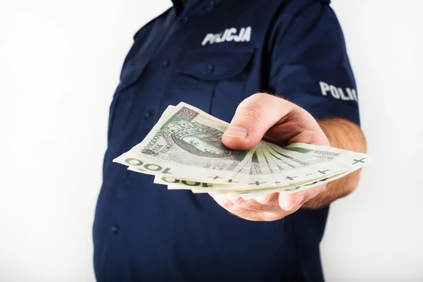 The policeman taking bribe — Stock Photo, Image