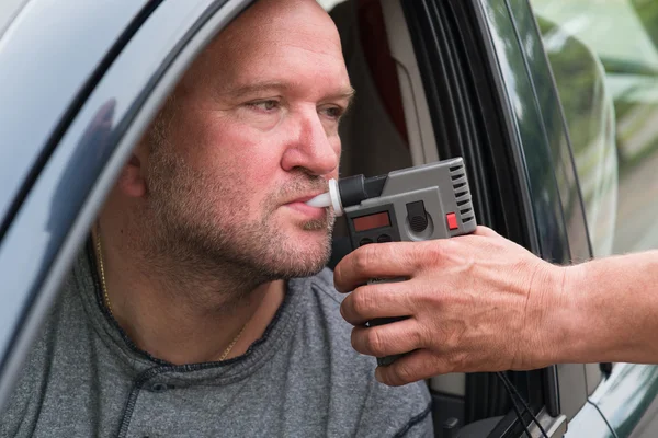 Examination of sobriety by a policeman — Stock Photo, Image