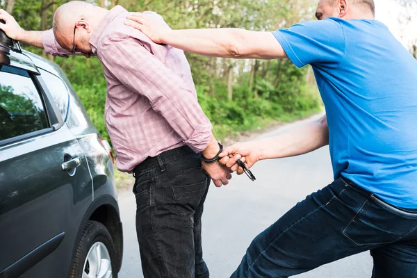 The arrest of a man — Stock Photo, Image