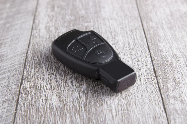 Car key on the wooden table — Stock Photo, Image