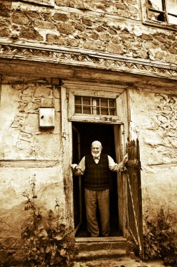 The Old Man Waiting at Doorway
