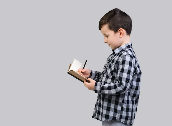 Schoolboy Gray Shirt Writes Notebook Year Old Boy Studies Studio — Stock Photo, Image