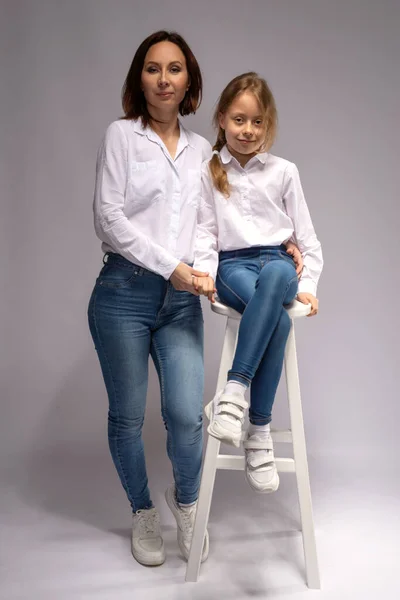 Mom Daughter Jeans White Shirts Gray Background Mothers Day Family — Stock Photo, Image