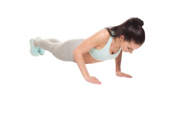 atletik kadın beyaz bir arka plan üzerinde şınav. Fitness mod