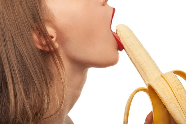 Horny girl eats and licks the banana, oral sex — Stock Photo, Image