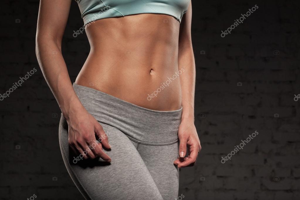 Detector slim veteraan Fitness female woman with muscular body, do her workout, abs, abdominals  Stock Photo by ©Max5799 83856782