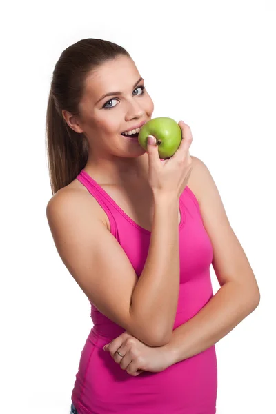 Model looking woman eating an apple Stock Picture