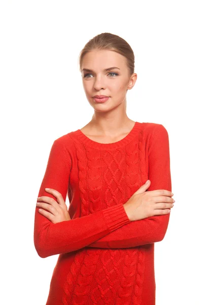 Модель позирует в красном платье на белом фоне Лицензионные Стоковые Фото