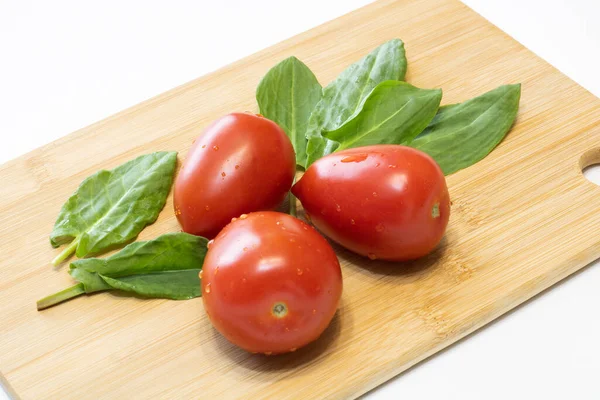 Tomatoes Sorrel Wooden Cutting Board — Stock Photo, Image