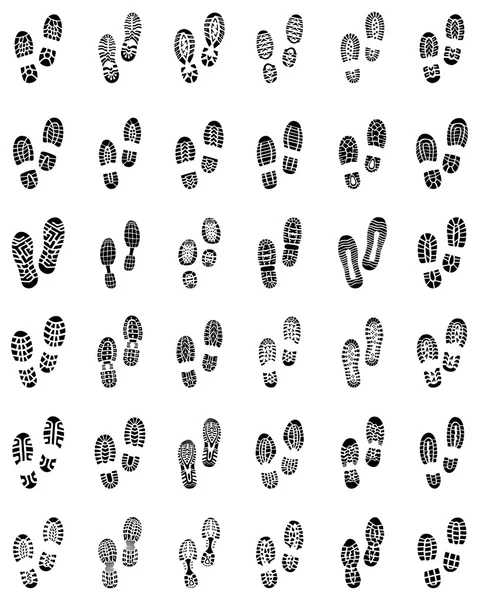 Отпечатки обуви — стоковый вектор