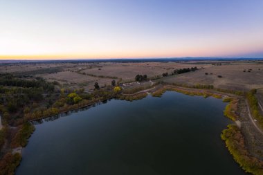 Lake drone aerial view at sunset in Alentejo, Portugal
