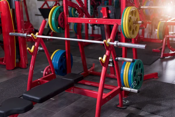 Modern gym interior with equipment. Fitness center interior