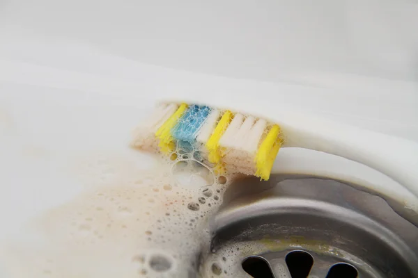 Blood and toothpaste on the toothbrush — Stock Photo, Image