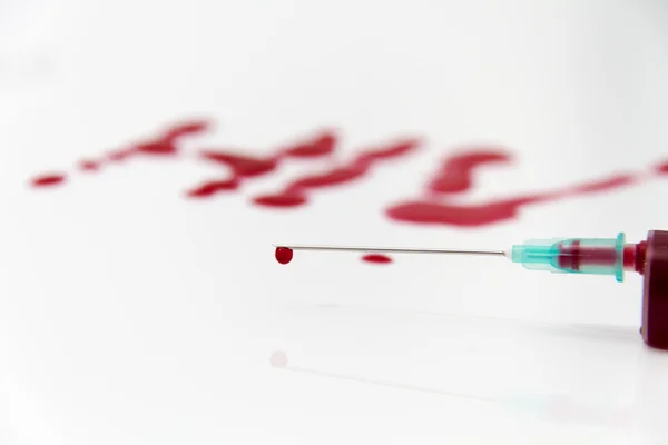 Syringe of Red Blood Test for research HIV AIDS Concept Idea — Stock Photo, Image