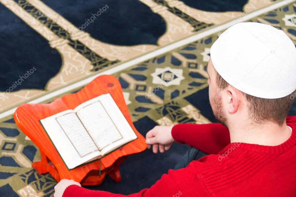 Young muslim man showing Islamic prayer