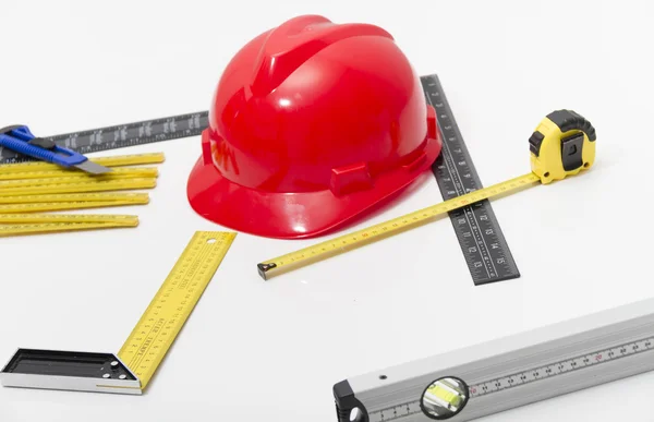 Hjälm och verktyg för konstruktionsritningar och byggnader — Stockfoto