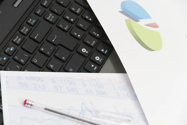 Businessman  with coffee and laptop analyzing of the  monitoring — Stock Photo, Image