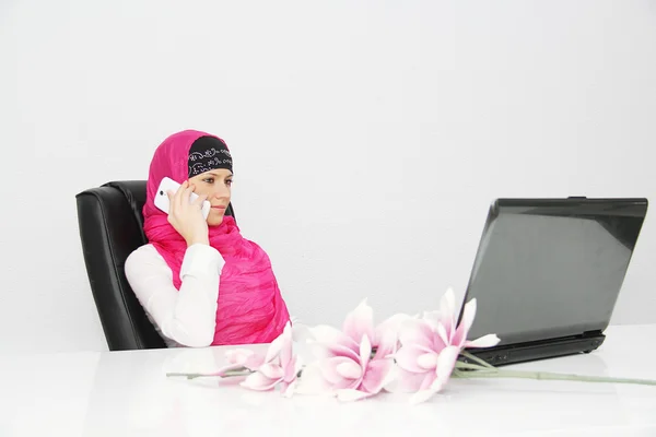 Beautiful young muslim business woman with laptop in office — Stock Photo, Image