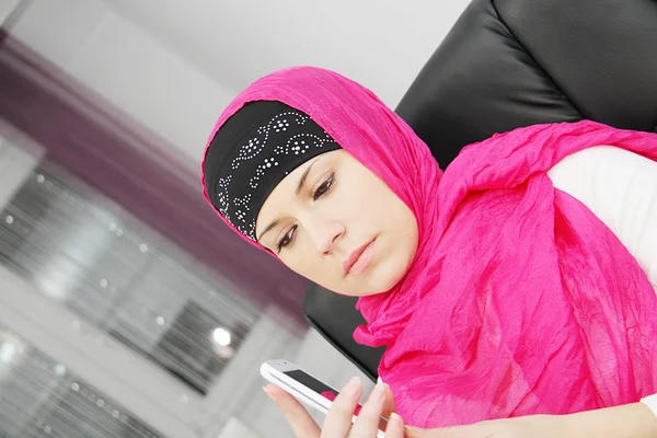 Beautiful young muslim business woman with laptop in office — Stock Photo, Image