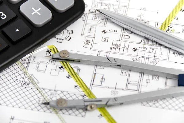 Architectural project, pair of compasses, rulers and calculator — Stock Photo, Image