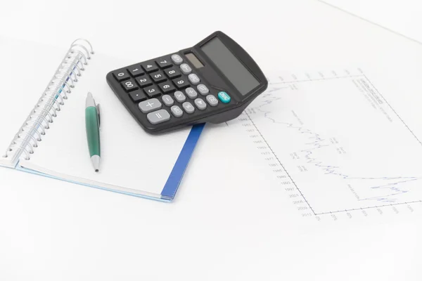 Business concept with calculator, pen and notebook — Stock Photo, Image