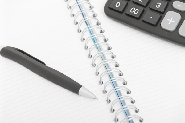 Geschäftskonzept mit Taschenrechner, Stift und Notizbuch — Stockfoto