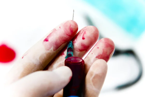 Syringe in laboratory environment — Stock Photo, Image