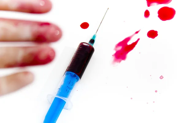 Syringe in laboratory environment — Stock Photo, Image
