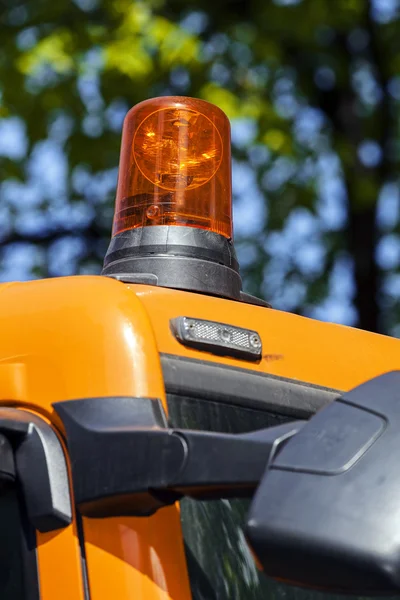 Excavator digging rotating light — Stock Photo, Image