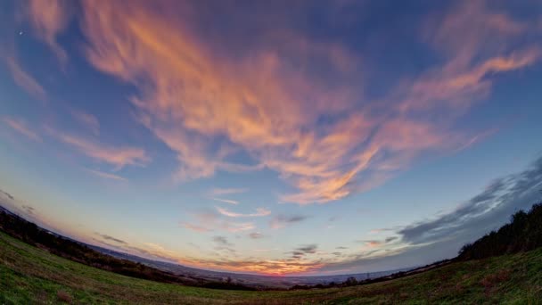 Sunset on a field outside of town — Stock Video