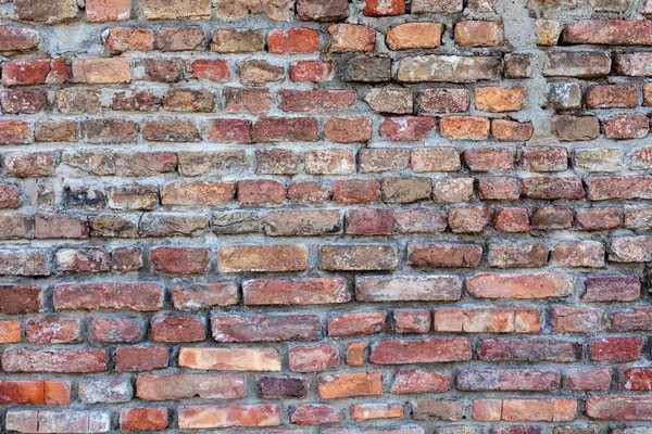 Помаранчева стара цегляна стіна — стокове фото