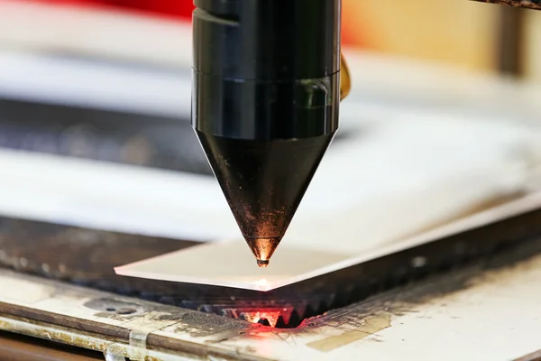 Red laser on cutting machine — Stock Photo, Image