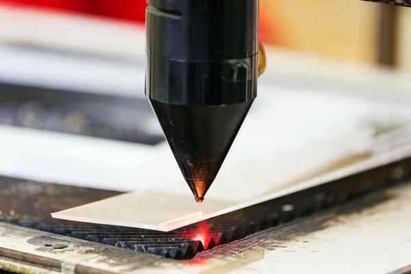 Red laser on cutting machine — Stock Photo, Image