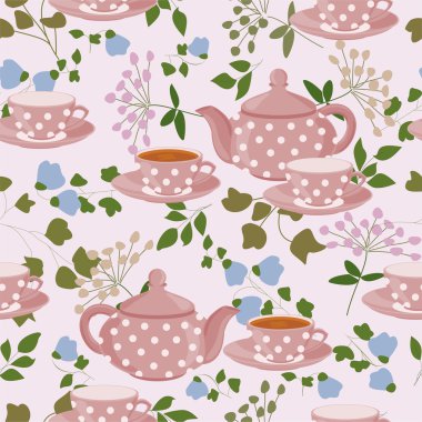 Çaydanlıklar, bardak çay, yeşil dallar ve çiçekler.