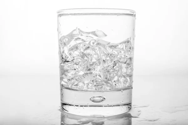 Glass of pure water with ice cubes. — Stock Photo, Image