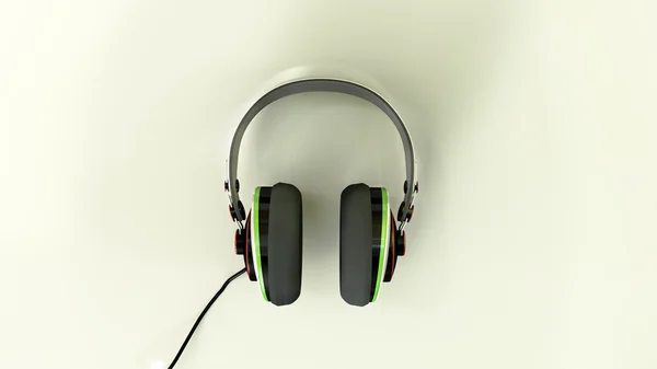 Headphones on a refelctive white surface — Stock Photo, Image