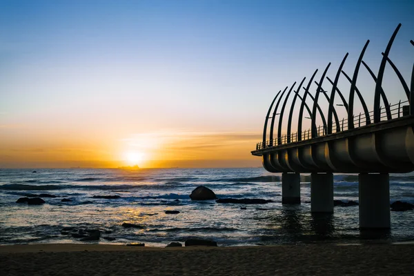 Umhlanga durban Pier im Sonnenaufgang Stockbild