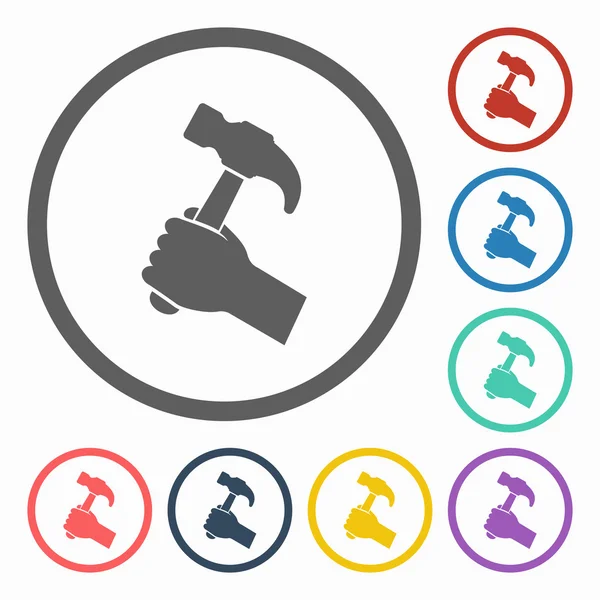 Hammer in hand icon — Stock Vector