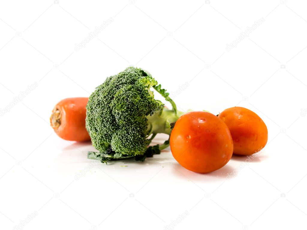 Isolate group of carrot, broccoli and tomatoes