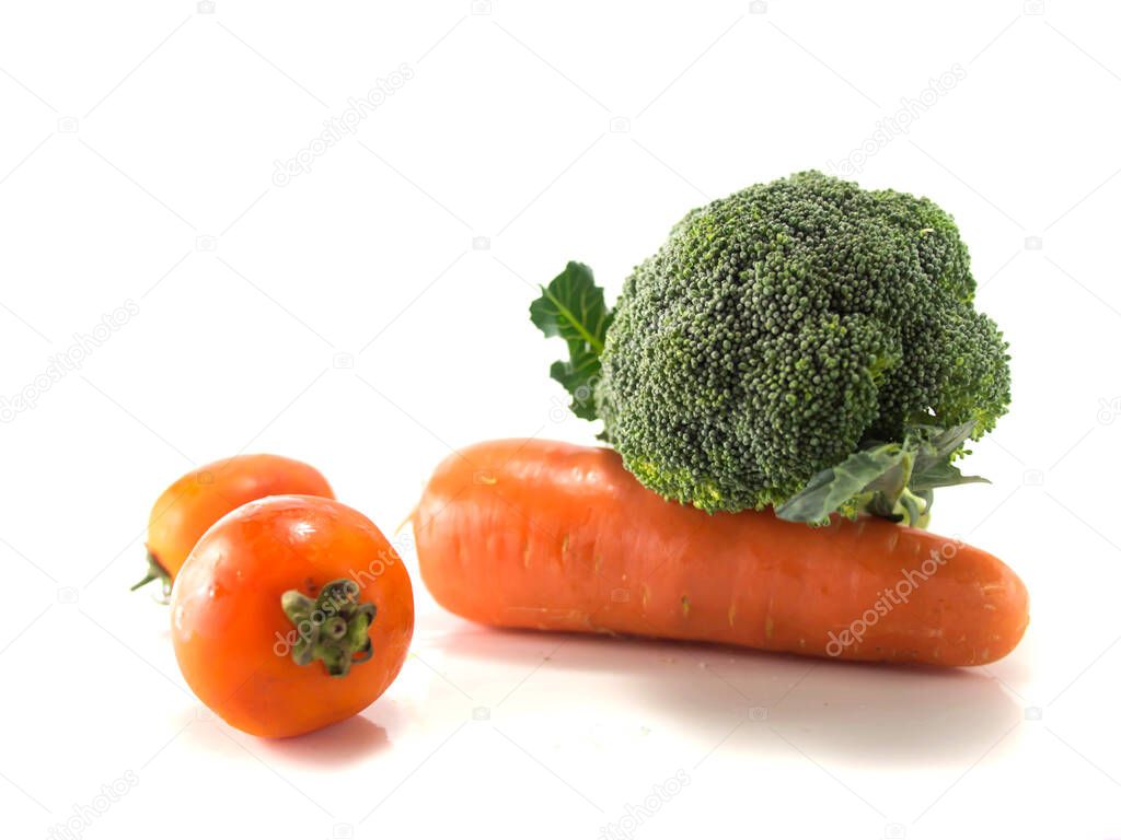 Isolate group of carrot, broccoli and tomatoes