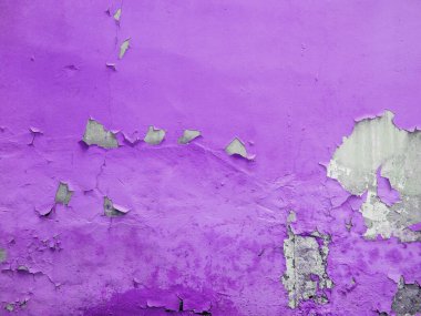 Arkasında grunge beton dokusu olan sarı boyalı bir duvar.